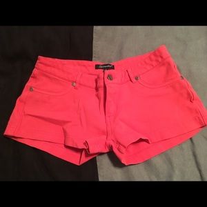 Pink/ coral stretchy denim shorts
